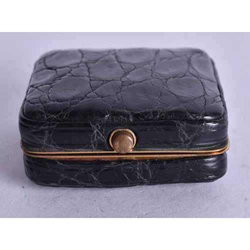 1359 - A VINTAGE LEATHER CASED TRAVELLING WATCH. Running. 4.25 cm square.