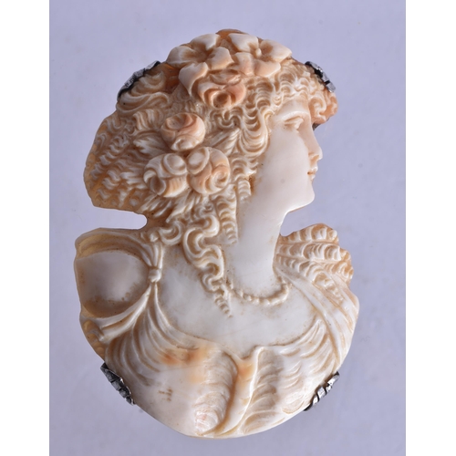 1360 - A SILVER AND CAMEO SHELL BROOCH. 20 grams. 5.5 cm x 4 cm.