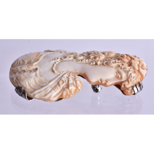 1360 - A SILVER AND CAMEO SHELL BROOCH. 20 grams. 5.5 cm x 4 cm.