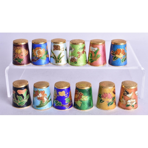 1363 - TWELVE CHINESE CLOISONNE ENAMEL THIMBLES. 130 grams. 2.5 cm x 2 cm. (12)