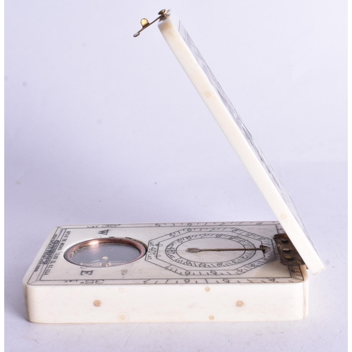 1367 - A SCRIMSHAW DECORATED COMPASS. 9.5 cm x 6 cm.