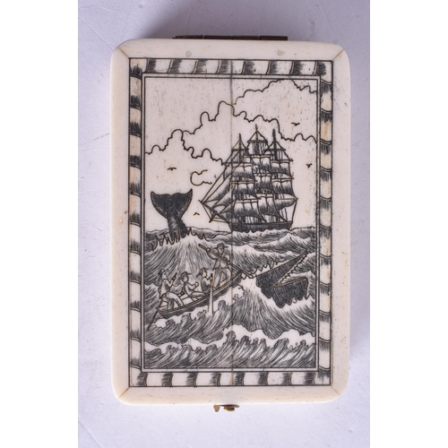 1367 - A SCRIMSHAW DECORATED COMPASS. 9.5 cm x 6 cm.