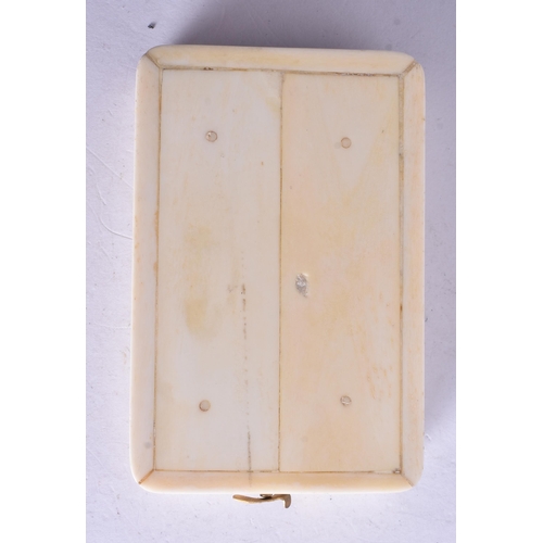 1367 - A SCRIMSHAW DECORATED COMPASS. 9.5 cm x 6 cm.