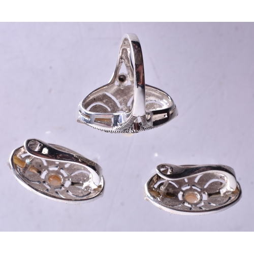 1369 - SILVER AND MARCASI8TE RING, EARRINGS AND PENDANT. 25 grams. 5 cm x 2 cm. (4)