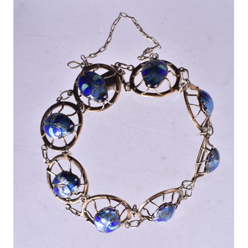 1381 - AN UNUSUAL ENAMELLED LADYBIRD BRACELET. 13.5 grams. 14.5 cm long.