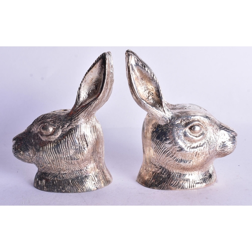 1382 - A PAIR OF SILVER PLATED RABBIT CONDIMENTS. 517 grams. 7.5 cm x 5.25 cm.