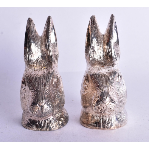 1382 - A PAIR OF SILVER PLATED RABBIT CONDIMENTS. 517 grams. 7.5 cm x 5.25 cm.