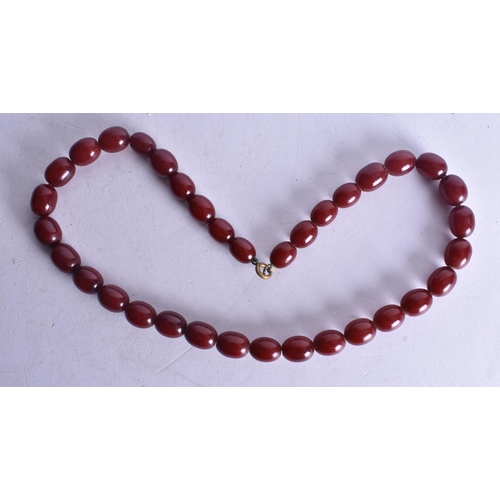 1394 - Cherry Bakelite Bead Necklace (24g). 40 cm long, each bead 0.75 cm wide.