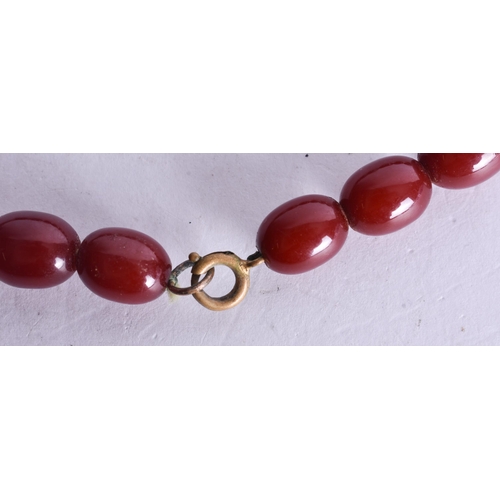 1394 - Cherry Bakelite Bead Necklace (24g). 40 cm long, each bead 0.75 cm wide.