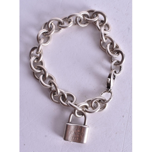 1447 - Tiffany & Co. Sterling Silver Belcher Bracelet inc. Padlock (34g). 16 cm wide.