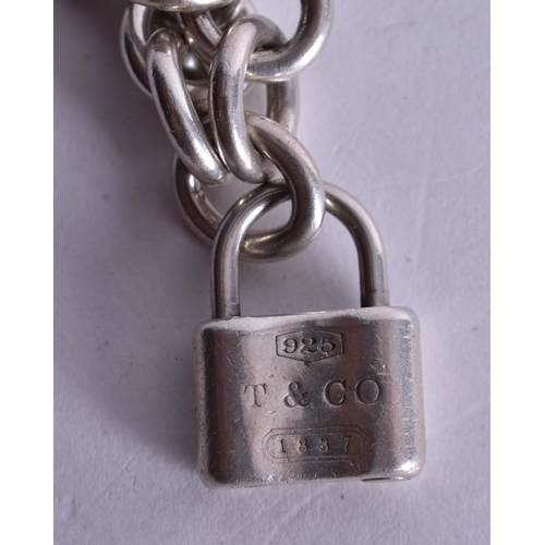 1447 - Tiffany & Co. Sterling Silver Belcher Bracelet inc. Padlock (34g). 16 cm wide.