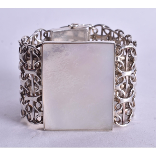 1448 - Sterling Silver Wide Bracelet Set with Mother of Pearl (104g). 15 cm wide.
