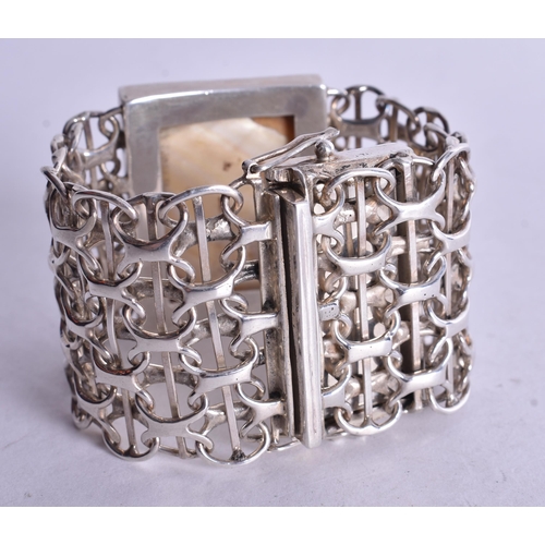1448 - Sterling Silver Wide Bracelet Set with Mother of Pearl (104g). 15 cm wide.
