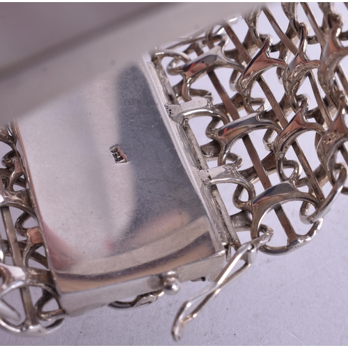 1448 - Sterling Silver Wide Bracelet Set with Mother of Pearl (104g). 15 cm wide.