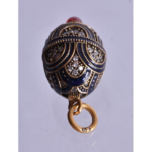 1471 - A Silver Gilt and Enamel Gem Set Pendant.  2.9cm x 1.5cm, weight 5.9g