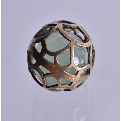 1472 - A Silver Gilt Encased Jade Pendant.  Stamped 88, 2.8cm x 1.4cm, weight 5.2g