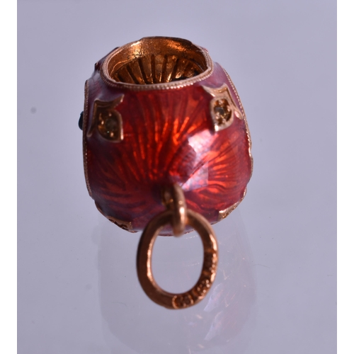 1476 - A 14 Carat Gold and Red Enamel Pendant inset with an Elephant.  Stamped 56, 2.6cm x 1.3cm x 1.3cm, w... 