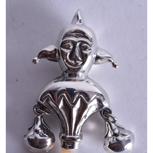 1483 - A Babies Rattle with a Silver Jester Top.  Stamped 925.  9.7cm x 2.8cm, weight 18.2g