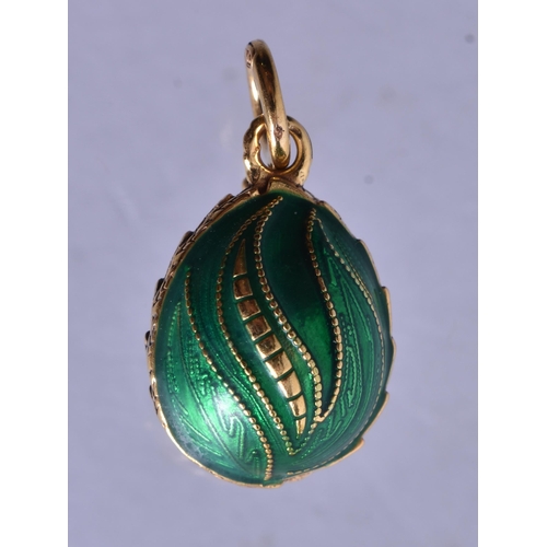 1490 - A Gilt Mounted Lily Pendant.  2.6cm x 1.5cm, weight 6.4g