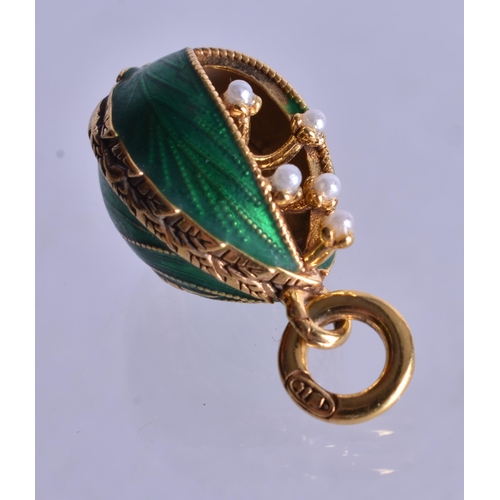 1490 - A Gilt Mounted Lily Pendant.  2.6cm x 1.5cm, weight 6.4g