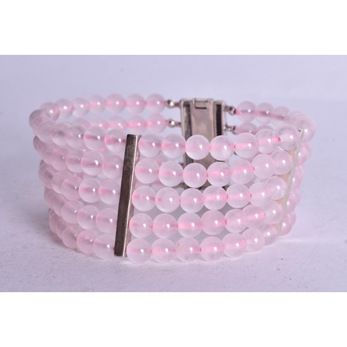 1506 - A Five Strand Rose Quartz Bead Bracelet.  19.5cm x 3cm, weight 60.8g