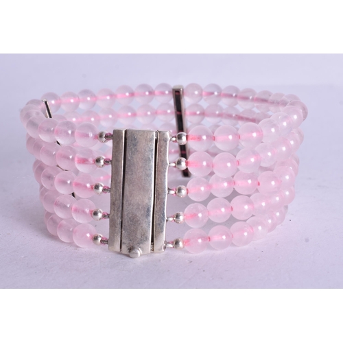 1506 - A Five Strand Rose Quartz Bead Bracelet.  19.5cm x 3cm, weight 60.8g