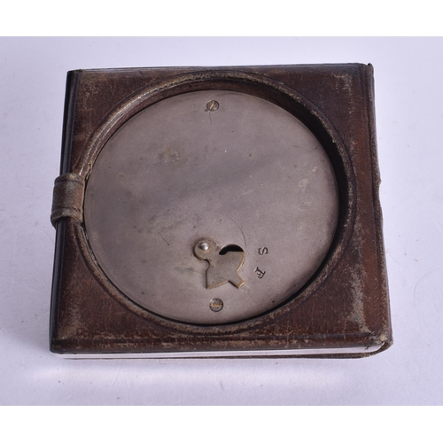 1524 - A Silver Cased Travel Clock with a fitted Leather Cover.  Not working.  Hallmarked London 1924.  7.6... 