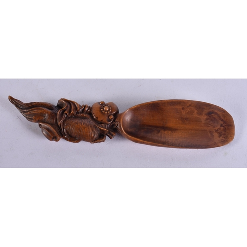 1567 - A Carved Oriental Spoon.  18cm x 4cm, weight 26g