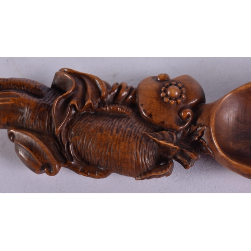 1567 - A Carved Oriental Spoon.  18cm x 4cm, weight 26g