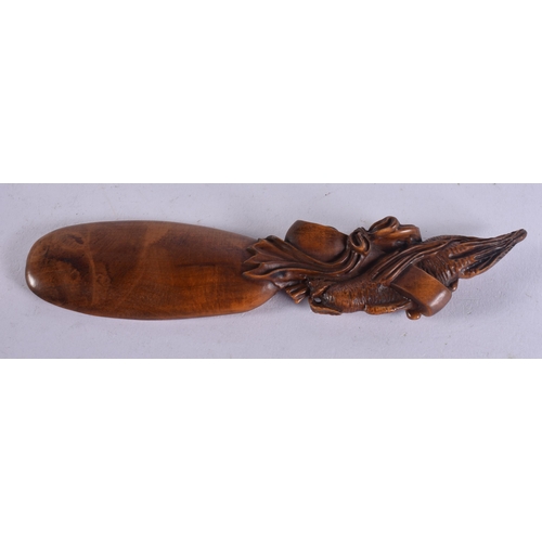 1567 - A Carved Oriental Spoon.  18cm x 4cm, weight 26g
