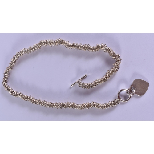 1587 - A Silver Link Necklace with Heart Clasp.  Stamped 925.  43cm long, weight 67g