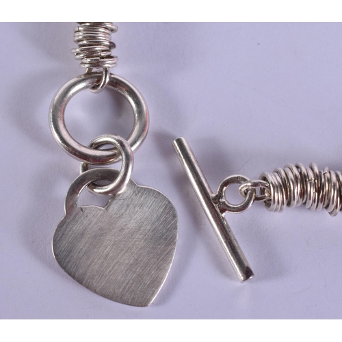 1587 - A Silver Link Necklace with Heart Clasp.  Stamped 925.  43cm long, weight 67g