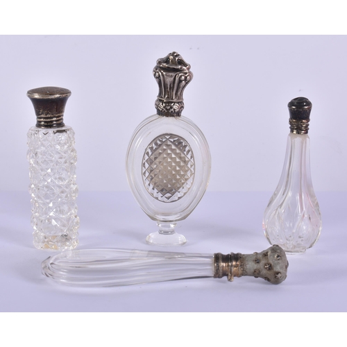 1597 - Four Silver Topped Scent Bottles.  Hallmarks include Birmingham 1920.  Largest 9.8cm x 4.3cm x 1.8cm... 
