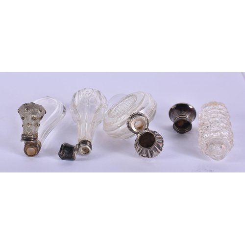 1597 - Four Silver Topped Scent Bottles.  Hallmarks include Birmingham 1920.  Largest 9.8cm x 4.3cm x 1.8cm... 