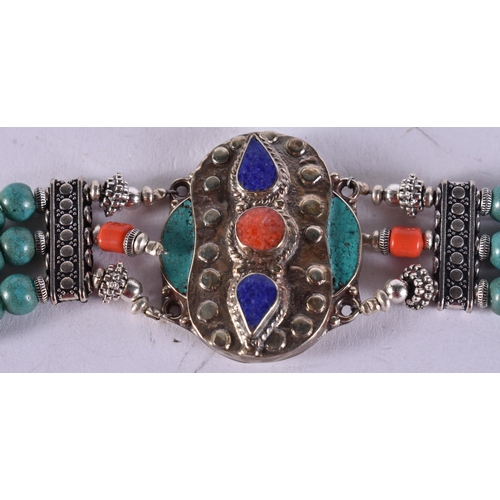 1605 - A Tibetan Style Hardstone Bracelet.  20.5cm long, weight 47.3g