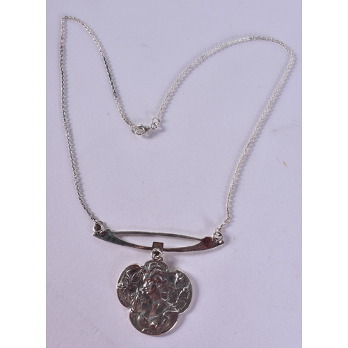 1617 - A Sterling Silver Nouveau Style Pendant Necklace with an Embossed Girl Decoration.  Pendant 5cm drop... 
