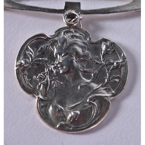 1617 - A Sterling Silver Nouveau Style Pendant Necklace with an Embossed Girl Decoration.  Pendant 5cm drop... 