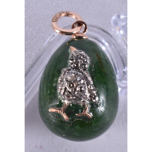 1640 - A Continental 14 Carat Gold Mounted Jade Egg Pendant with Diamond Chip Decoration.  Stamped 56, 2.6c... 