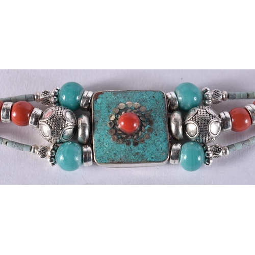 1670 - A Tibetan Style Hardstone Bracelet.  19cm long,  weight 29.7g