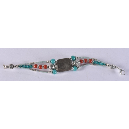 1670 - A Tibetan Style Hardstone Bracelet.  19cm long,  weight 29.7g