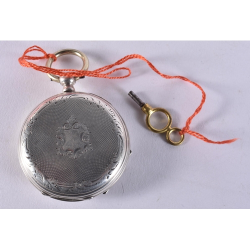 1673 - An Erotic Pocket Watch with a Christmas Themed Dial, with Key.  Working, Key Wind.  4.8cm diameter