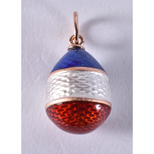 1690 - A Continental 14 Carat Gold Mounted Enamel Egg Pendant.  Stamped 56, 2.5cm x 1.2cm, weight 2.7g