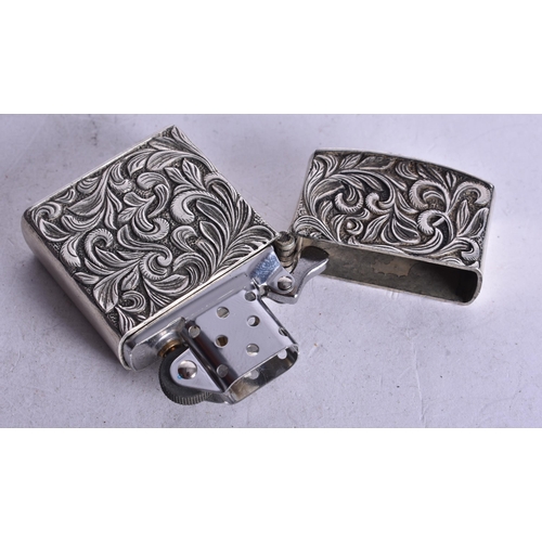 1732 - A Silver Cased Lighter.  Chinese Marks AB 990.  5.9cm x 3.9cm x 1.6cm, weight 79.1g