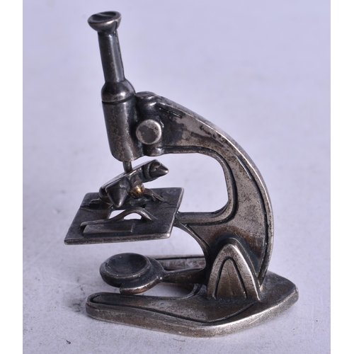 1735 - A Silver Model of a Microscope.  Stamped 925, 4.1cm x 3cm x 1.9cm, weight 18.6g
