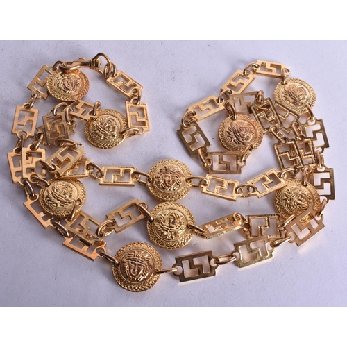 1752 - A Versace Style Gold Tone Medusa Head Coin and Greek Key Link Necklace.  104cm long, weight 292g