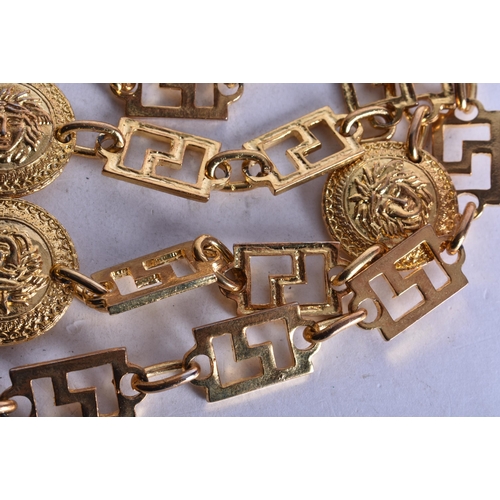 1752 - A Versace Style Gold Tone Medusa Head Coin and Greek Key Link Necklace.  104cm long, weight 292g