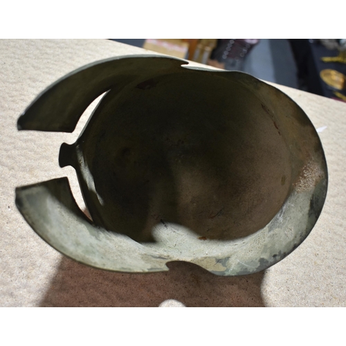 1864 - A BRONZE HELMET. 32 cm x 32 cm.
