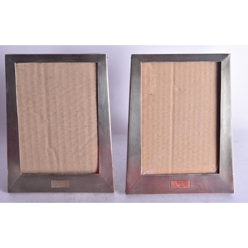 1869 - A Pair of Wood Backed Silver Mounted Picture Frames with Engine Turned Decoration and vacant cartouc... 