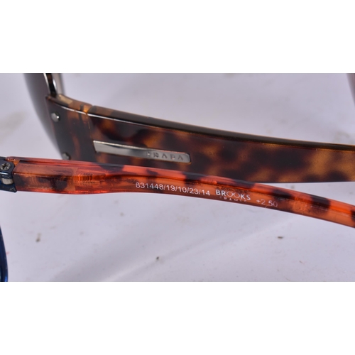 1911 - THREE PAIRS OF PRADA SUNGLASSES and another. (4)  WE ARE UNABLE TO SHIP THIS LOT TO THE USA OR CANAD... 