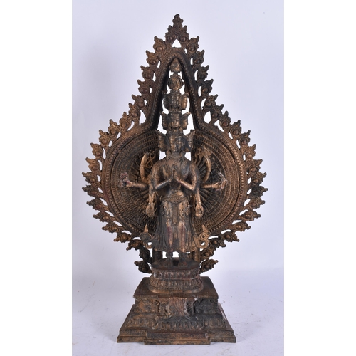1916 - A LARGE TIBETAN MULTI ARM DEITY. 40 cm x 18 cm.